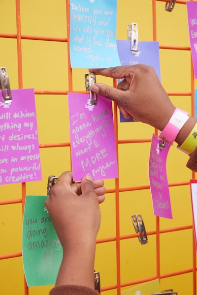 Attendees could also write down their goals and other inspirational messages, and clip them to a wall for others to see.