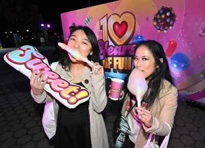The Battery Park Esplanade in downtown Manhattan was transformed into a “candified carnival” where visitors could watch a drone show and enjoy bespoke Candy Crush-themed food and drink like glow-in-the-dark cotton candy.