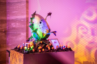 Perfectly paired with a welcoming glass of champagne were crunchy brandy truffles—part of an interactive, completely edible pastry installation entitled “Metamorphosis,” which took more than 10 hours of chocolate work to craft.