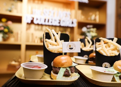 Attendees noshed on cafeteria-inspired fare like sliders, chicken fingers, and fries.
