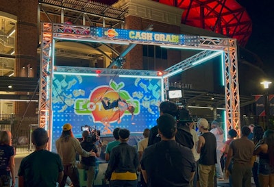 The Georgia Lottery customized Interactive Entertainment Group’s Giant Human Claw Machine as a “Cash Grab” experience.