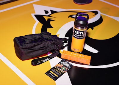 Attendees received a custom-branded “tailgate-ready” kit featuring a CALPAK water bottle holder, a YETI Rambler bottle, Live Tinted products, and a $50 credit from Postmates.