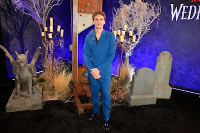 Other premiere details included a black carpet adorned with gargoyles, candelabras, gravestones—and even a guillotine.