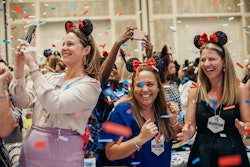 During a group photograph, guests were instructed to yell 'We're going to Disney World!' When they did, 10 confetti cannons exploded. 'The crowd went wild with excitement, and some were moved to tears,' remembered Grinnals. See more: See a Conference Inspired by Fairy Tales