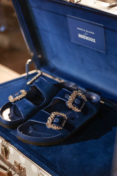Guests could browse through some of the brand’s famous fashion collaborations, including Rick Owens’ strappy sneaker boots, Jil Sander clogs, bejeweled Manolo Blahnik Arizona and Boston styles, and handmade Dior mules.