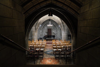 The Crypt Sessions are held in a chapel underneath the Church of the Intercession in Harlem, which features arched ceilings supported by massive columns.