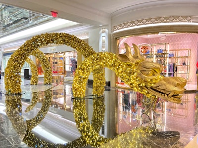 Another photo moment—which is returning to the hotel for the 2023 celebrations—was the Golden Dragon art installation located next to Louis Vuitton in the Shoppes' luxury wing. The display stood more than eight feet tall and measured 34 feet long, and was covered in five miles of metallic stranded material and lit by 13,750 computer-programmed LED lights with sparkle strobes.