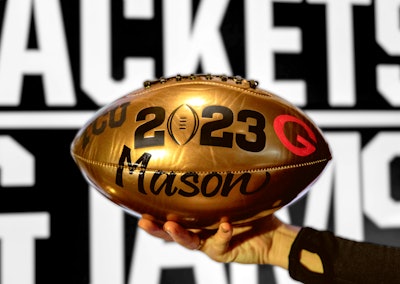 The limited-edition footballs have become collectibles and a go-to grab at the CFP VIP gifting suite. This year's football, in a nod to Hollywood glam, shone in gold. Lettering artist Lauren Nisenson customized all the footballs.