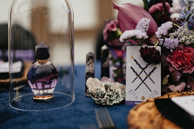 The tablescape for the dinner included amethyst crystals and the Good Fortune fragrance. Along with tarot readings, guests could also have personal and private aura readings by Rose Aura to help them see their energy and chakras.