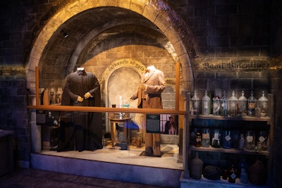 After successfully defeating a bogart with a Ridikkulus spell in the Defense Against the Dark Arts room, guests are guided into the Potions room, where the two professors' costumes and props from the movies are on display. Attendees are also invited to brew their own potion (choosing from Amortentia, Draught of Living Death, Felix Felicis, Poly Juice, and Skele-Gro) to earn points toward their house.