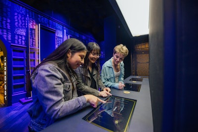 In one of the many interactive features of the exhibit, guests can 'cast a spell' by tapping their tech-enabled wristband on a sensor to activate a mini game. By participating, guests are rewarded with 10 points for their house. Points for each house are tallied and displayed at the very end of the experience. 'In the design process, we knew that we wanted to personalize the experience, so we talked about many ways of doing that. We decided that the use of gamification was a nice way to allow a personal connection to each visitor as well as the ability to work together as a team, gain points, and receive customized memories at the end of your experience via a personalized email,' said Zaller.