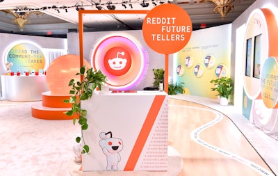 “The Communi-Tea Bar” (seen back left corner) invited guests to “read the communi-tea leaves” and further interact with futurism on Reddit’s platform. Tea bags were individually wrapped based on their subreddit, and featured future-telling posts (like “I think the 2032 presidential election is the first ‘gas prices don’t matter’ election” from the r/electricvehicles subreddit). After your tea was brewed, a QR code was revealed at the end of the tea bag’s string, which led to the actual subreddit thread on the platform. And in another interactive moment, a quiz asked visitors true and false questions about what they think Redditors are future-telling about. For example, “grasshoppers are the new kale,” which was true.