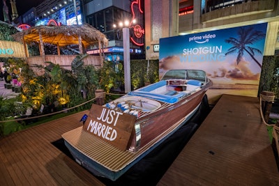 Other fun nods to the movie included a speedboat adorned with “Just Married” and a helicopter photo op.