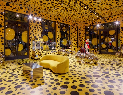 Creepy life-like robot of artist Yayoi Kusama spotted painting