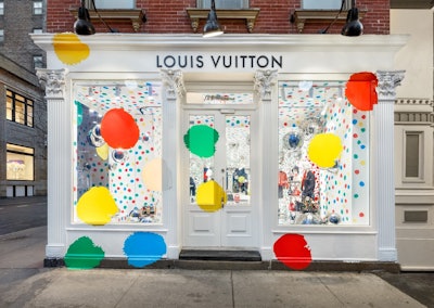 Creepy life-like robot of artist Yayoi Kusama spotted painting shop window  in New York