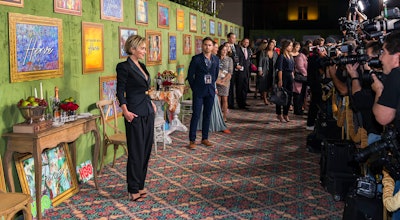 The premiere of the HBO film My Dinner With Hervé, which covers the life of actor Hervé Villechaize, took place in 2019 in Los Angeles. The event, which was designed by Billy Butchkavitz, featured a step-and-repeat inspired by Villechaize’s first career as a painter in France. The title of the film was displayed within various framed paintings against a green wall.