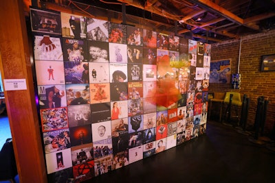 The activation also featured a dedicated space called Universe of Hip-Hop, a special exhibit celebrating 50 years of hip-hop music and culture through the lenses of photographers like Janette Beckman, Michael Lavine, Danny Clinch, B+ (Brian Cross), Greg Noire, and Gunner Stahl. Designed and curated by artist Cey Adams—the founding creative director of Def Jam Recordings—the space featured iconic imagery of dozens of artists, including Run-D.M.C., LL Cool J, Biggie, Tupac, Kendrick Lamar, and 21 Savage.