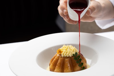 The babba rum cake includes custard cream and berry compote.