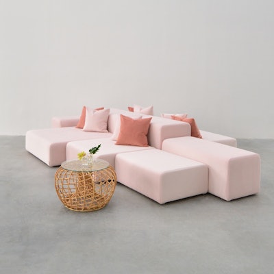 Looking for a different kind of lounge seating? Consider Taylor Creative's Lounge Modular couch in pink, which is available for rent from its New York and Los Angeles warehouse locations. The couch is adaptable (there are options with eight or 10 pieces), and can make an individual seating cluster or a larger shared seating arrangement. Ottomans and seat-backs can be placed in many different configurations based on your event needs, and pillows in varying pink hues are also on offer to complete the look. The Lounge Modular rents for $1,450. Decorative pillows are not included, but can be rented for an additional $30 each.