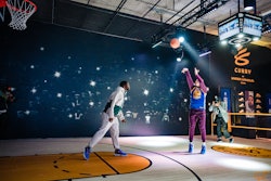 There was a photo op where fans could recreate Steph Curry’s famous buzzer-beating shot in the game against Oklahoma City, and a pop-up locker room was filled with custom branded lockers honoring UA Basketball athletes.