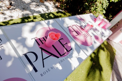 Adjacent to The Pale's bar, guests sipped complimentary wine while playing Jenga and rosé pong on a branded table with pink cups and pingpong balls.