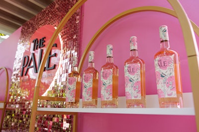 Rosé brand The Pale attended FoodieCon with a custom-built vintage rosé bar complete with mirrored panels and an arched shelving display.