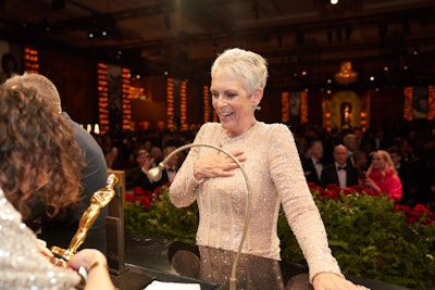 As the first stop for most of the night's A-listers, the Governors Ball has a spot for winners like Jamie Lee Curtis (pictured) to get their trophies engraved. The Academy made sure fans got into the action too by hosting the second annual Oscars Night at the Museum at the Academy Museum of Motion Pictures. More than 1,500 guests could explore the museum’s galleries, pose on a red carpet, shop for exclusive merchandise, and watch the show in the museum's David Geffen Theater.