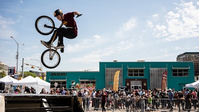 The block party ended with a wow-worthy BMX stunt show, where bikers flipped and jumped off of ramps, plus performed tricks in the “Globe of Dough” (a stunt cage more commonly known as the “Globe of Death”).