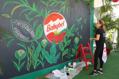 Babybel promoted its new plant-based cheese at the Grand Tasting with samples and rotating chalk mural artists.