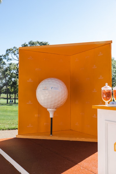 There were also curated photo moments—like a giant golf ball—and a swag bar, while the vibrant color scheme and hanging paint chips nodded to the tournament's title sponsor, paint manufacturer The Valspar Corporation. Overall, 125,000 people attended the four-day golf tournament.