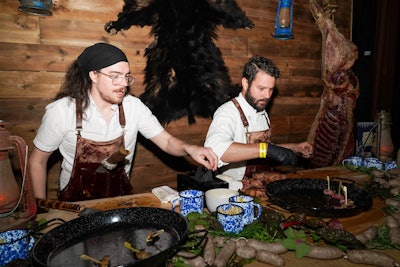 “The show is about a plane crash in the wilderness. Obviously, it’s dark and sinister, but we’ve also made it a fun place to explore,” Kehoe said. And she was right—take it from the butcher shop, which guests accessed by walking through hanging faux animal hides, to sample cuts of steak courtesy of butchers wearing “blood”-stained aprons.