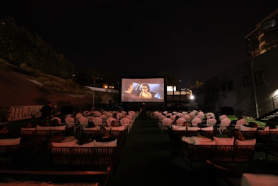 On Frosty Palace's opening night, guests with 7:30 p.m. reservations sat down to a drive-in style, outdoor screening of the series' first episode.