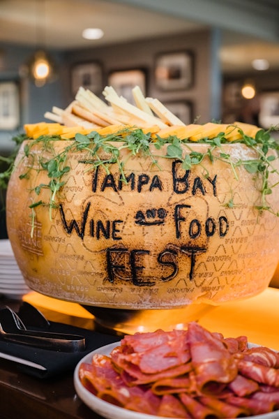 Offerings inside an engraved cheese wheel were paired with charcuterie.