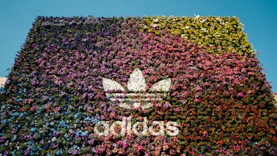 Perhaps the most memorable floral design of the festival came from the Adidas x Bad Bunny activation, which boasted 50,000 live florals in 60 different varietals. Elevation Vertical Gardens handled the exterior vertical garden systems and Eric Quintana handled the planting element.