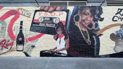 DJ Cocoa Chanelle's mural is located in the Bronx on Tremont Avenue.