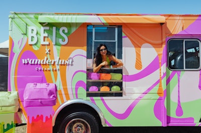 Another eye-catching activation at Revolve Festival came from Shay Mitchell's travel accessories brand BÉIS. In honor of its new Sherbert Collection, the brand took an approach inspired by sweet treats: It teamed up with Wanderlust Creamery to serve limited-edition ice cream out of a colorful on-site ice cream truck. In a fun touch, products from the Sherbert Collection were displayed on the side of the truck. The activation was produced by Food Truck Promotions.