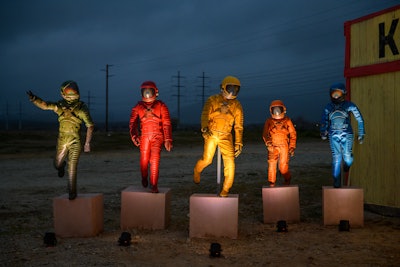 Outside, life-size recreations of the film’s colorful spacesuits greeted guests.