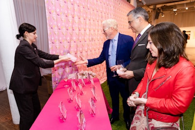 Mayorga also designed keepsake plates that guests could take home by selecting a flower from the installation and a corresponding plate.