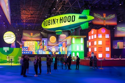 The benefit occupied a 30,000-square-foot space in the Javits Center with a whimsical recreation of New York City. The cherry on top? An oversize blimp boasting Robin Hood's logo in the organization's iconic green color, of course.