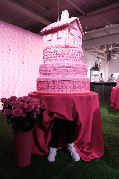 Multidisciplinary artist Yvette Mayorga created an environment in her signature frosted pink style, where guests could interact with enormous cakes embellished with flowers and other elements.