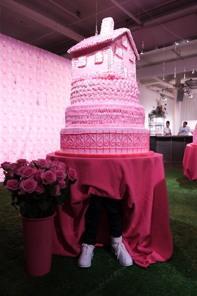 Multidisciplinary artist Yvette Mayorga created an environment in her signature frosted pink style, where guests could interact with enormous cakes embellished with flowers and other elements.