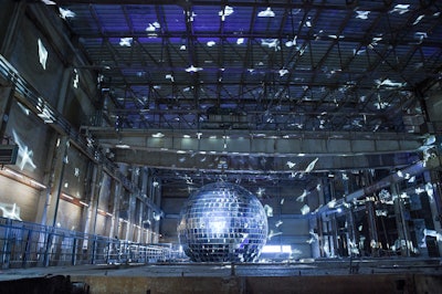 A decommissioned power plant isn't usually a go-to venue for a festival about arts and creativity. But for Toronto’s Luminato Festival, the Hearn Generating Station served as an ideal location to kick off its 10th anniversary in 2016. Artist Michel de Broin's 'One Thousand Speculations' installation, ­a gigantic mirror ball that measured almost 26 feet wide, helped transform the venue by casting reflective light throughout the raw, industrial space. See more: How to Bring a Decommissioned Venue Back to the Future