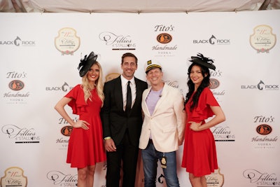 On May 5, the 11th Annual Fillies & Stallions Derby event—presented by Black Rock Thoroughbreds and Tito’s Vodka—took place at the Mellwood Art Center in Louisville. NFL star Aaron Rogers (second from left) posed on the red carpet.