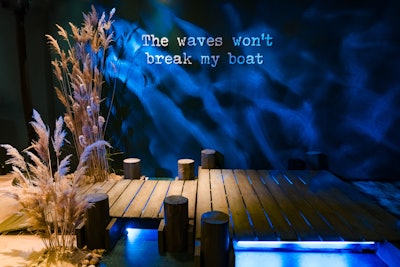A recreation of a pier in Suffolk, England, included a wave projection, seagrasses, and ocean scents and sounds as a nod to the English seaside feel of the album. It was also a direct reference to the ending scene of the “Eyes Closed” music video, where Sheeran is standing at the end of a pier.