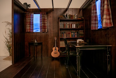 This installation was inspired by the setting from Annie Leibovitz’s photo of the singer journaling his lyrics. Journals were also placed on each desk where fans could share their own thoughts.