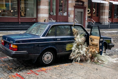 Vintage early 1990s Volvo 240s were parked outside each pop-up (and inside in Chicago). Inspired by the album’s intro trailer where Sheeran drives the same Volvo, each car was adorned with seagrasses spilling out, fitting the overall English seaside vibe of the album.