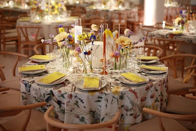 This year, the museum’s special events team introduced a floral-printed tablecloth with compositions of varying sized glass vases filled with orange poppies, cornflower, lilac sweet peas, yellow butterfly ranunculus, lavender lisianthus, and tulips. Three-dimensional printed lamps were placed on the tables, along with the flowers. CONCEPT Event Group handled the florals and decor; Flemington Event Carpet provided the carpeting; and Party Rental Ltd. and Taylor Creative Inc. handled the rentals. Other vendors included production: DreamVisible; tenting: Arena Americas; photo: Hypno; and scenic: SBI.