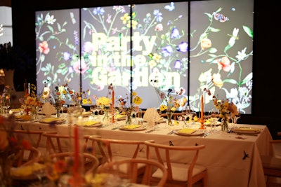 The floral motif ran across the menu, program, graphic printed scrim, custom printed china, and room projections. Jupiter Sound was tasked with audio and Bentley Meeker, lighting.