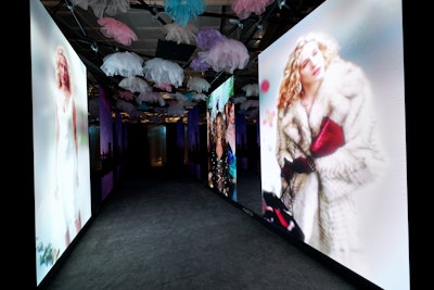 Fans could walk into “Carrie’s Closet Experience,' which highlighted the characters’ fashions from all seasons of Sex and the City through And Just Like That…. A floral design guided guests through the timeline of looks.