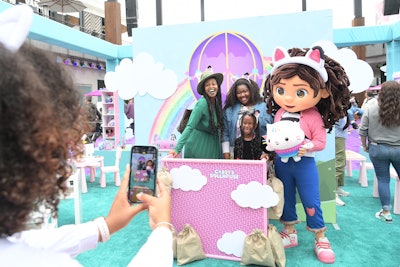 Guests could pose inside a hot air balloon photo op inspired by Gabby’s Dollhouse.